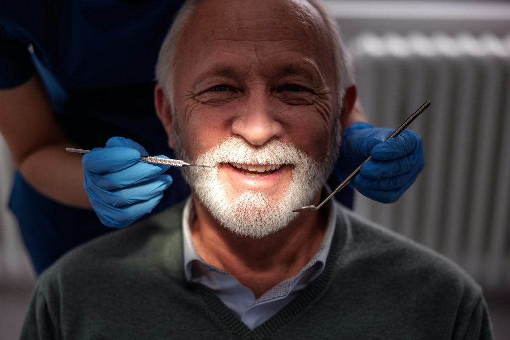 Senior man having dental checkup